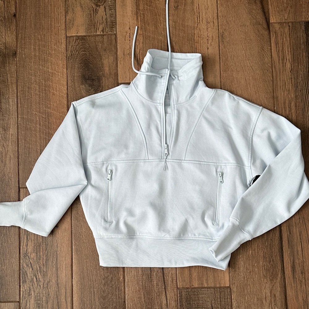 Women's light blue quarter zip active sweatshirt